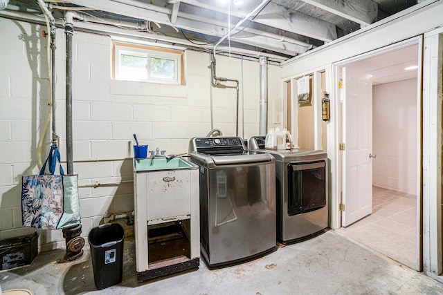 laundry room featuring washing machine and dryer