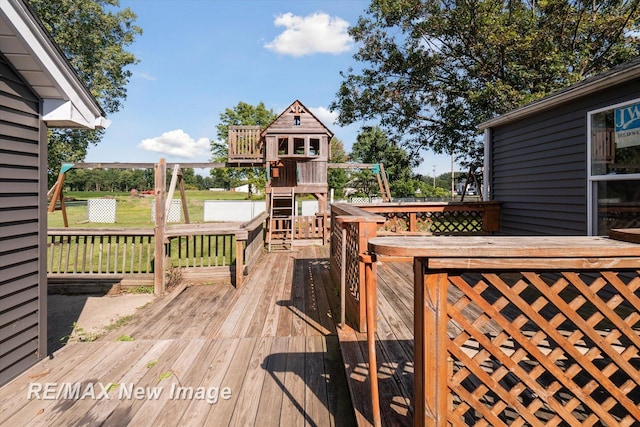 wooden deck with a playground