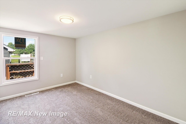 view of carpeted spare room