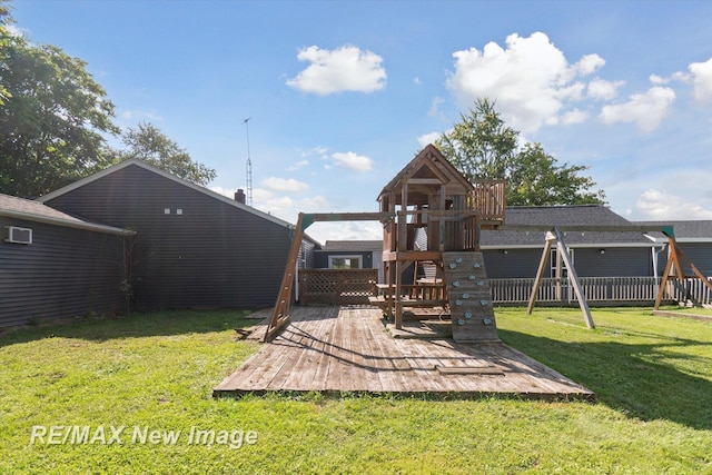 view of play area featuring a lawn