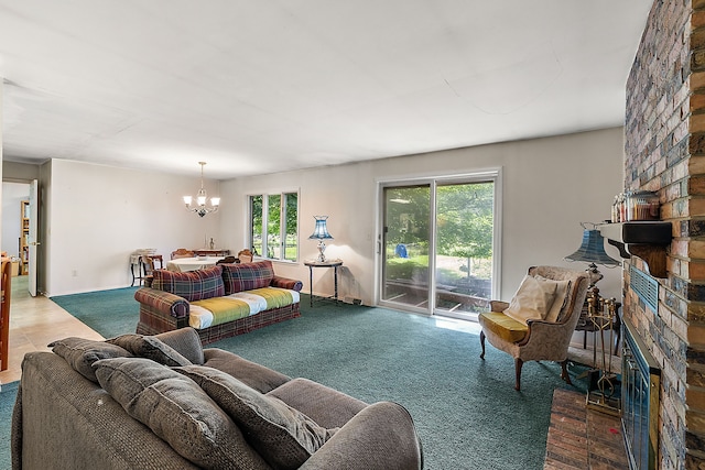 living room featuring carpet, an inviting chandelier, and a fireplace