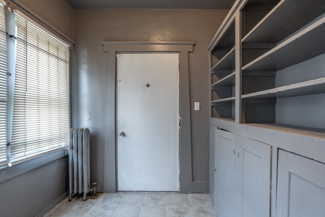 doorway featuring radiator