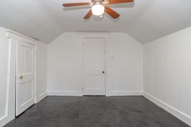 bonus room with ceiling fan and lofted ceiling