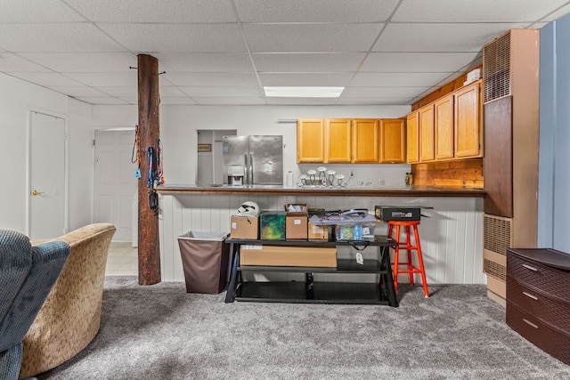 office area with carpet and a drop ceiling