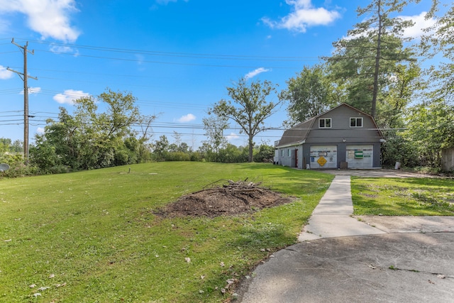 view of yard featuring a garage