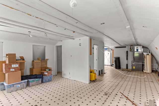 basement featuring carpet flooring and water heater