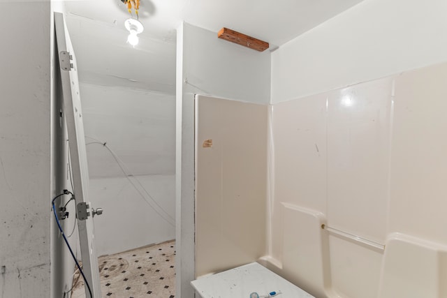 bathroom featuring walk in shower