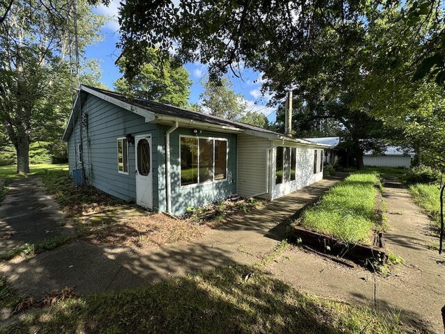 5490 S Harrison Rd, Houghton Lake, MI 48629 - view of single story home