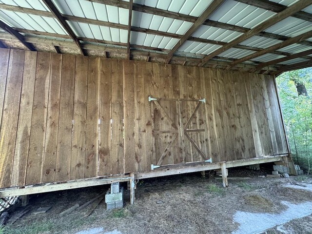 5490 S Harrison Rd, Houghton Lake, MI 48629 - exterior view of wood walls