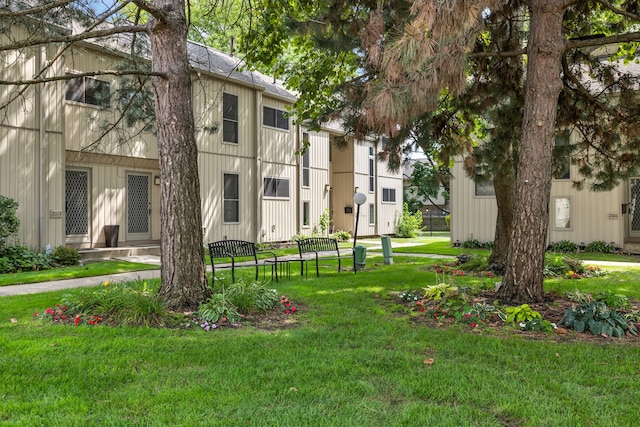 view of community with a lawn