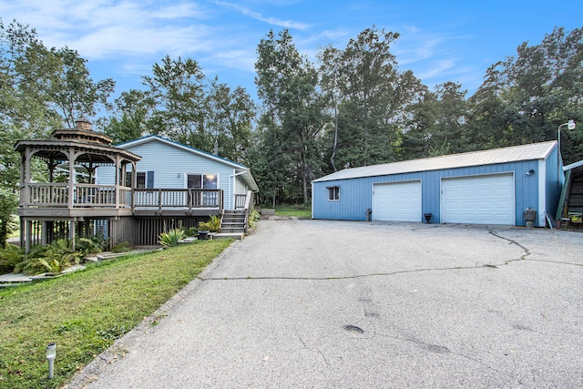 garage featuring a yard