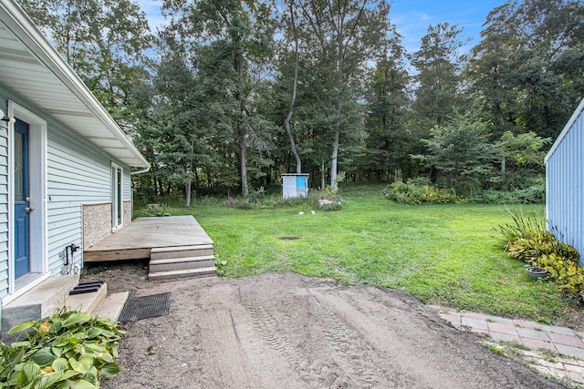 view of yard featuring a deck