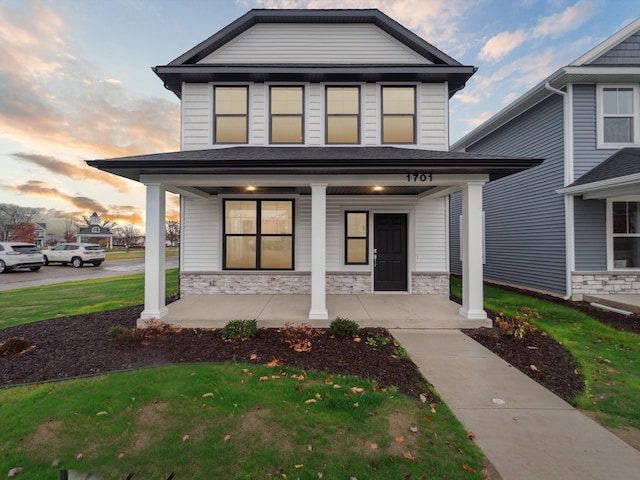 view of front property with covered porch