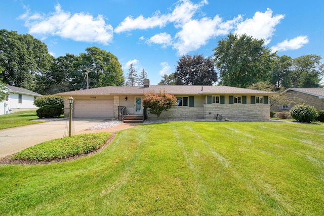 ranch-style home with a garage and a front lawn