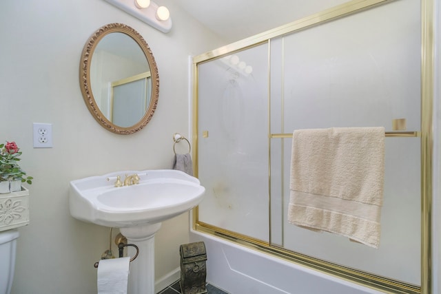 bathroom featuring enclosed tub / shower combo