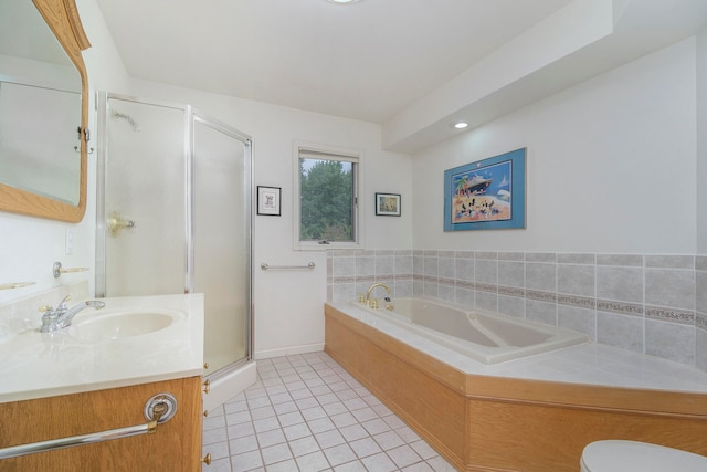 full bathroom with tile patterned flooring, vanity, separate shower and tub, and toilet