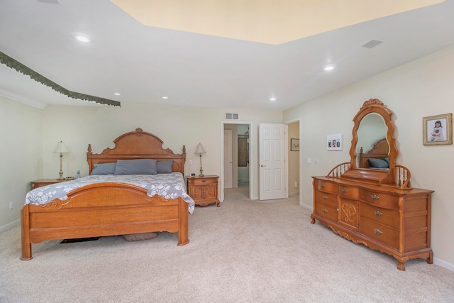 bedroom with light colored carpet