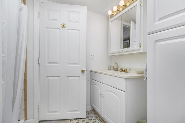 29100 Heritage Ln, Paw Paw, MI 49079 - bathroom featuring vanity and a shower with curtain