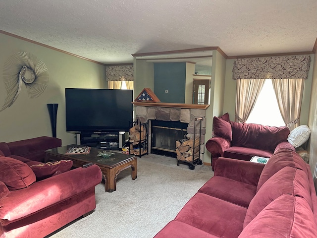 carpeted living room with ornamental molding, a stone fireplace, and a textured ceiling