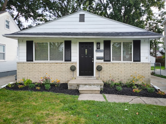 view of front of home with a front yard