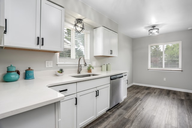 kitchen featuring dishwasher, white cabinets, dark wood-type flooring, and sink