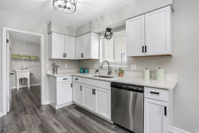 kitchen featuring dishwasher, dark hardwood / wood-style floors, white cabinetry, and sink