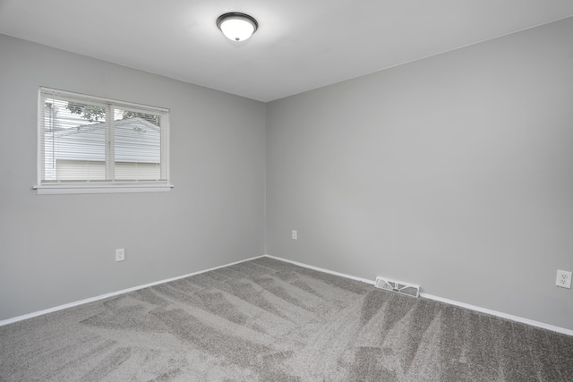 spare room with carpet flooring