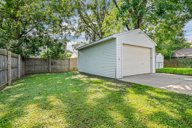 garage with a lawn