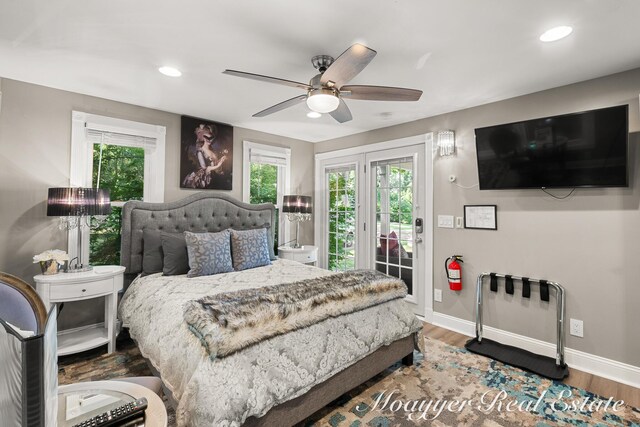 15 E Wall St, Douglas, MI 49406 - bedroom with access to exterior, baseboards, multiple windows, wood finished floors, and recessed lighting