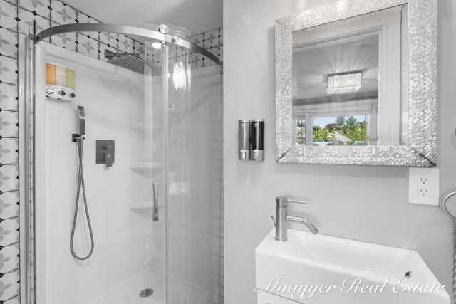 15 E Wall St, Douglas, MI 49406 - full bath featuring a stall shower and a sink
