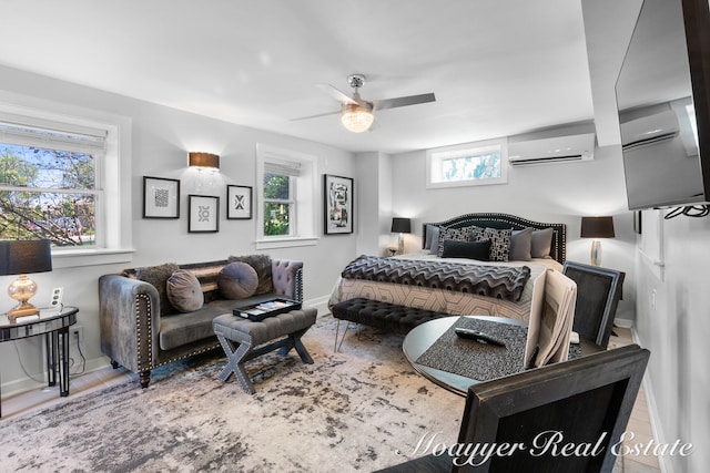 bedroom with multiple windows, ceiling fan, and a wall mounted air conditioner