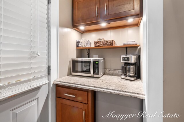 15 E Wall St, Douglas, MI 49406 - bar area with stainless steel microwave