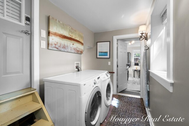 15 E Wall St, Douglas, MI 49406 - washroom featuring washing machine and dryer, brick patterned floors, and baseboards