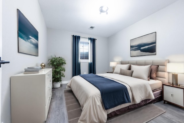 bedroom with light wood-type flooring