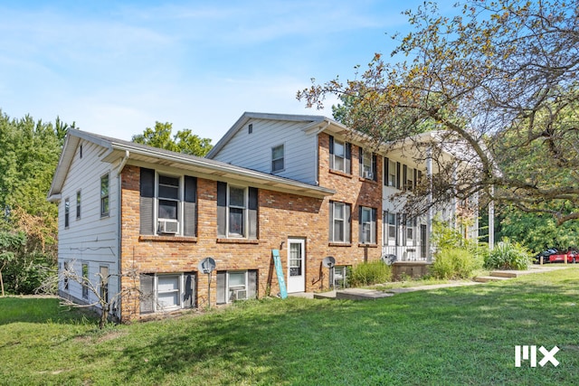 view of front of home with a front lawn