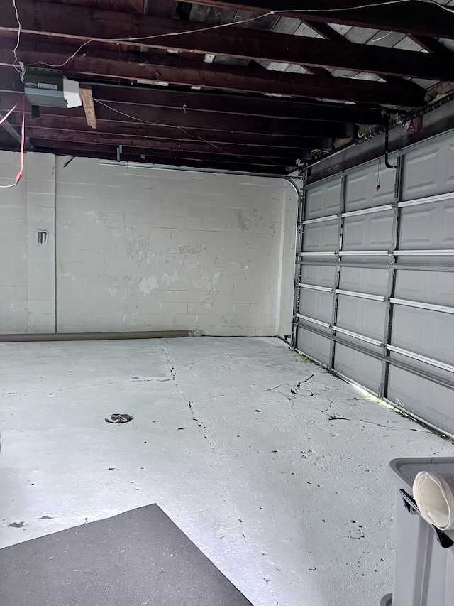 1460 S Dye Rd, Flint, MI 48532 - garage featuring concrete block wall