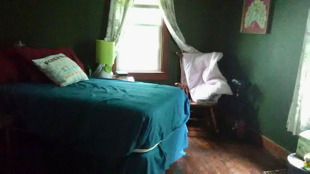 1460 S Dye Rd, Flint, MI 48532 - bedroom featuring wood finished floors