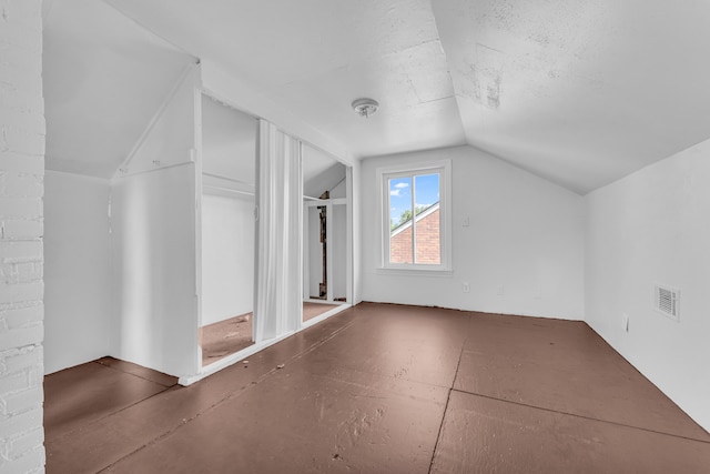 bonus room with lofted ceiling