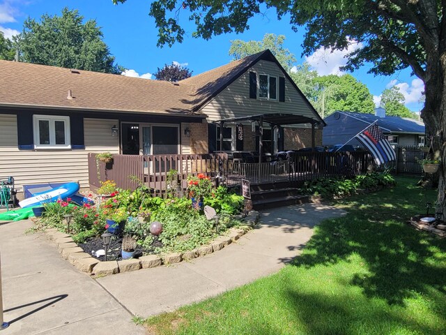 77 Maple Ln, Coldwater, MI 49036 - view of front of home featuring a wooden deck and a shingled roof