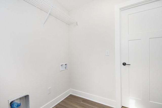 clothes washing area with washer hookup and dark hardwood / wood-style floors