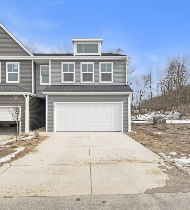 view of front of property featuring a garage