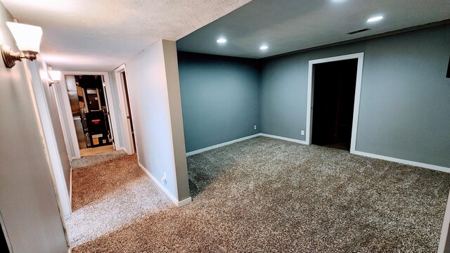 12448 Jefferson Rd, Morley, MI 49336 - unfurnished room featuring carpet flooring, recessed lighting, and baseboards