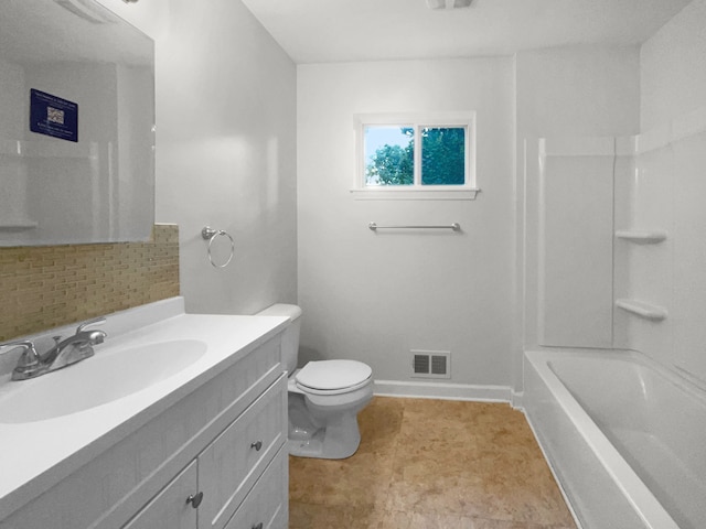 full bathroom with decorative backsplash, vanity, toilet, and washtub / shower combination