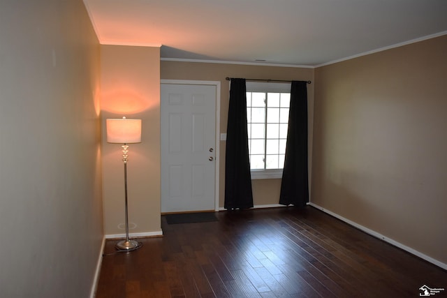 entryway featuring dark hardwood / wood-style flooring and crown molding