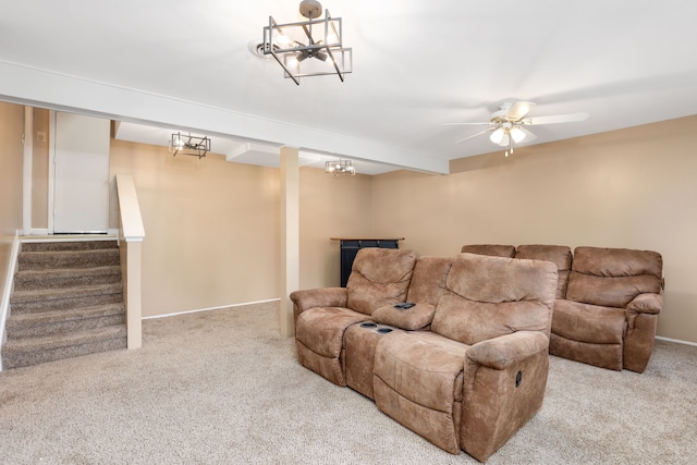 living room with ceiling fan and light colored carpet