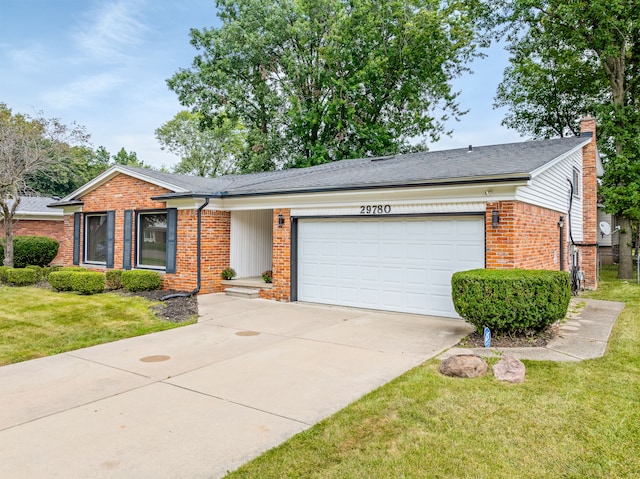 ranch-style house with a front yard and a garage