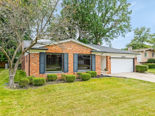 ranch-style house with a garage and a front lawn