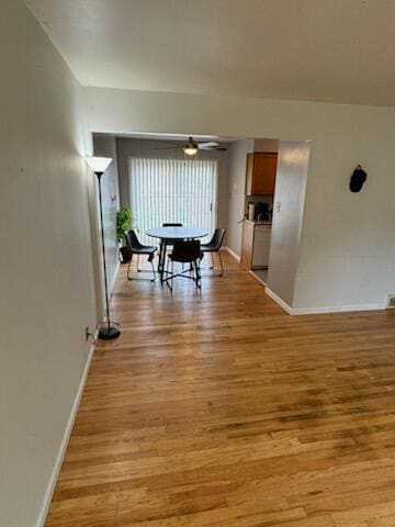 hallway with light wood-type flooring