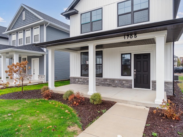 entrance to property with a porch