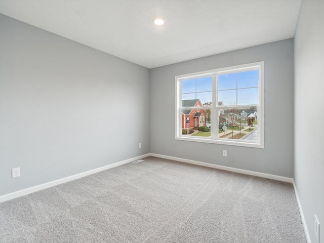 spare room with carpet flooring